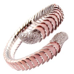 Bracelet bangle cobra en or blanc avec rubis émailléet diamants Roberto Coin