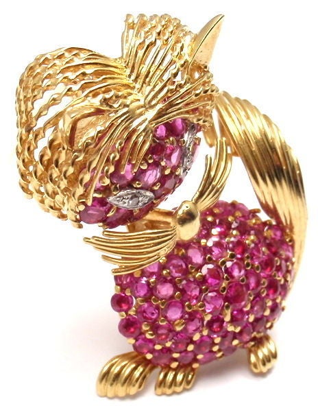 18k Yellow Gold Diamond Ruby Cat Brooch Pin by Tiffany & Co. 
With 80 round rubies and 2 round diamonds VS1 clarity, G color

Details: 
Measurements: 1 1/2