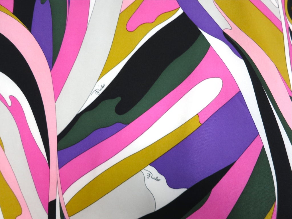 EMILIO PUCCI Abstract geometric swirl silk scarf in pink, ivory, purple, and black.  Engineered spiral motif border detailing.  Printed signature throughout