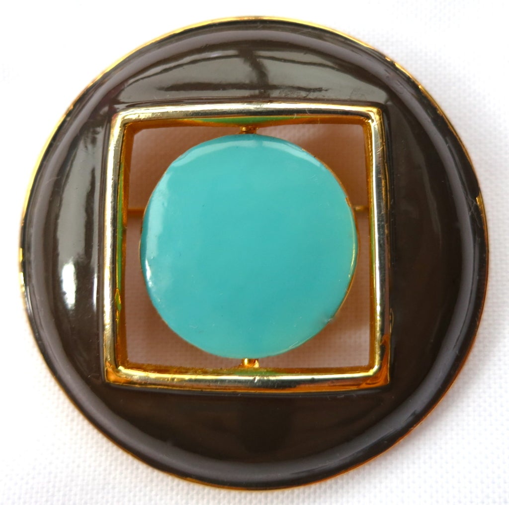 Vintage PIERRE CARDIN 1960's era, rotating circle in square, mod brooch pin with brown and turquoise enamel face.  The enamel finish circle rotates on a full axis, and can be worn with either turquoise or the pink face side out.  Dome shape
