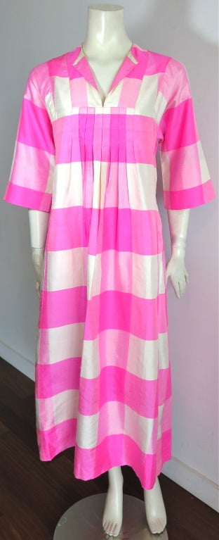 Vintage JIM THOMPSON 1960's Dupioni spun silk ivory & bright pink dress.  Large scale gingham pattern with iridescent warp and weft effect.  Twin front lapels with V-shape neckline with pleated front for a voluminous silhouette.  Concealed, waist