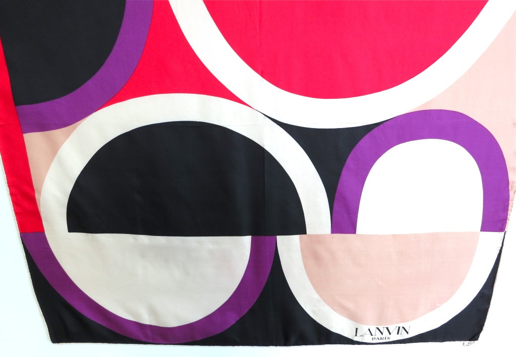 Vintage LANVIN PARIS 1960's era geometric silk scarf in light blush, scarlet red, purple, black, and ivory.  Hand rolled edge construction with signature logo print at bottom left edge