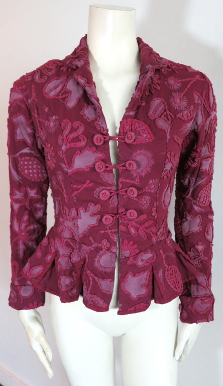 NATALIE CHANIN Project Alabama handmade floral jacket made from recycled cotton knit jersey.  Fitted waist silhouette with a flared hem line.  The jacket features an all over frosted floral print with hand embroidered lattice, and outline stitch