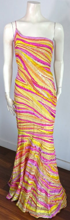 NAEEM KHAN Hand beaded yellow & magenta full length dress.  Fully lined in silk chiffon.  Concealed, side zipper entry

Excellent condition with no signs of wear.

*MEASUREMENTS*

There is no size label attached.  We estimate the dress to be a