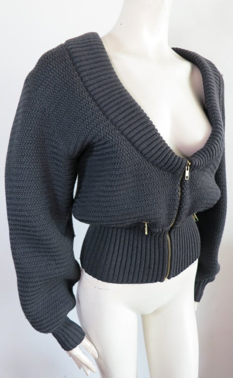 Vintage AZZEDINE ALAIA blouson heavy weight sweater jacket with metal zipper details.  Wide rib waistband with scooped neckline.