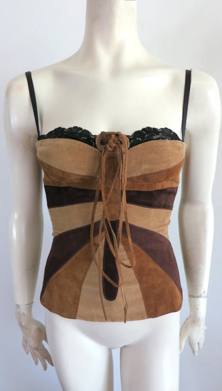 DOLCE & GABBANA suede and corduroy butterfly bustier .  Lined in leopard printed silk satin with built in black lace bra.  Boned construction with leather lacing at center front, top panel.  Underarm to underarm: 14