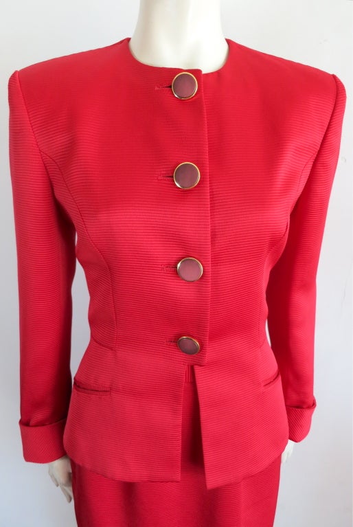 Vintage CHRISTIAN DIOR 1980's era scarlet silk ribbed skirt suit.  Dual waist level, welt pockets.  Oversized button front closures.  Fish tail style back silhouette.  Fully lined

Jacket- Flat rear shoulder from side to side: 16-1/2
