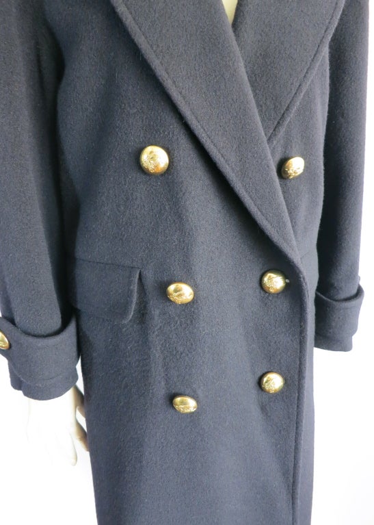 BURBERRY LONDON Navy wool & camel hair military coat.  Oversized, logo engraved dome metal closures.  Dual waist level flap pockets.  Shoulder tab detailing.  Fully lined. Underarm to underarm: 20