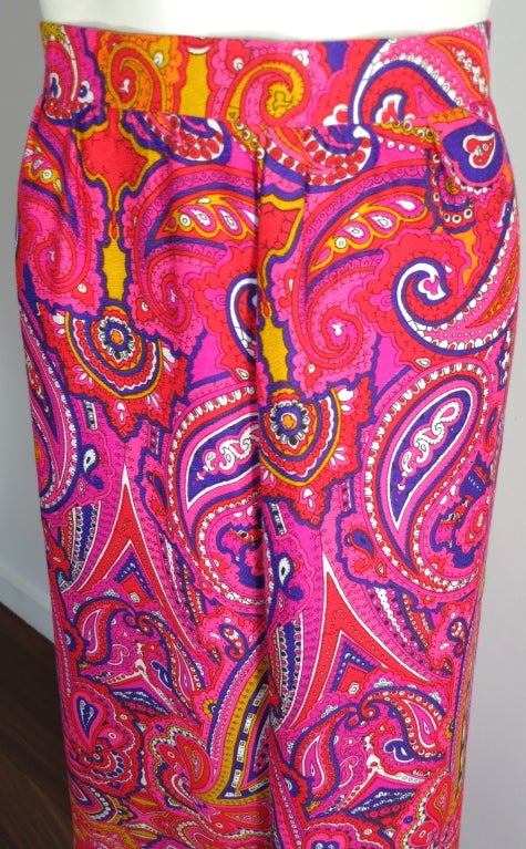Vintage 1970's ALEX COLMAN multi-color paisley maxi skirt with center back concealed zipper entry.  Front pleat construction.  Flat waist from side to side: 15