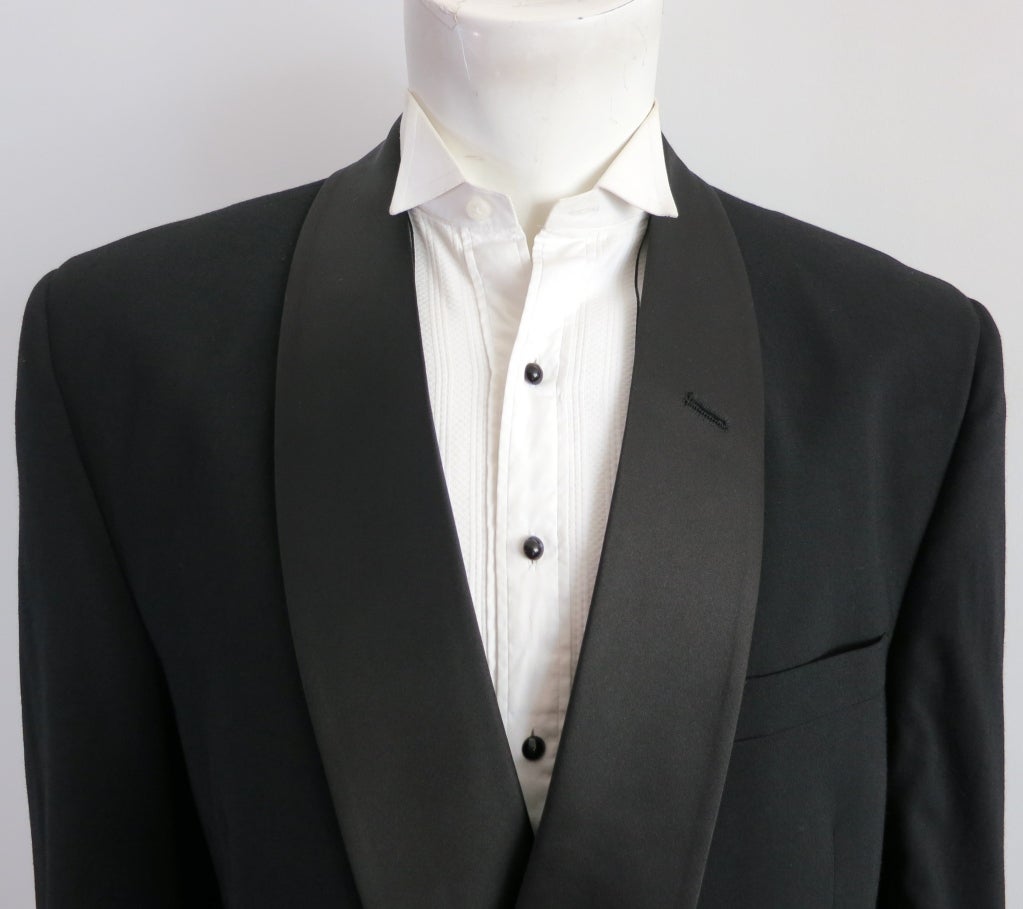 Vintage CHRISTIAN DIOR MONSIEUR 1980's shawl lapel tuxedo.  Silk satin detail at lapel front, waistband, and side pant stripes.

Jacket- Underarm to underarm: 22
