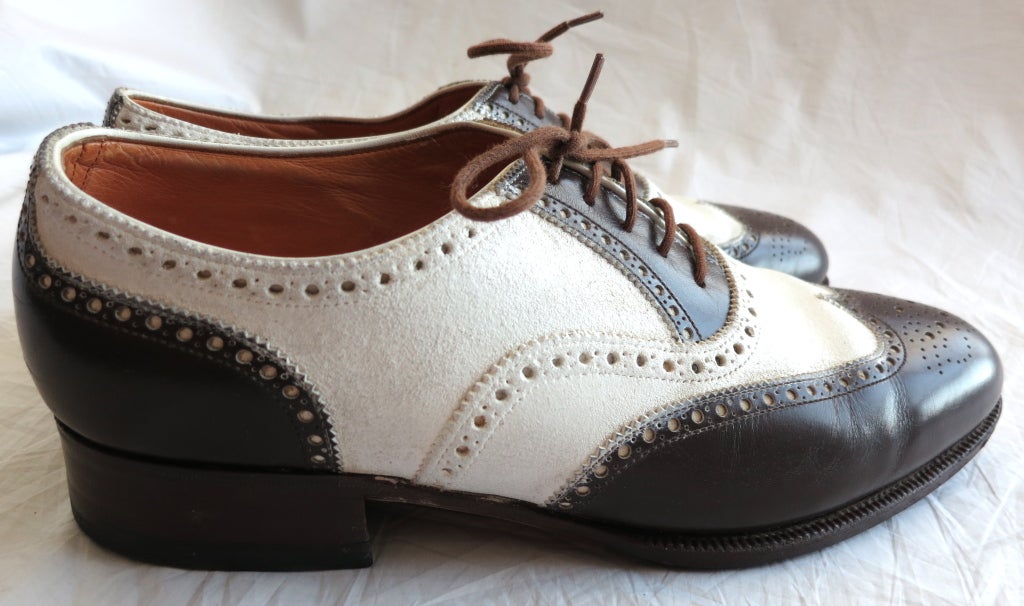 Vintage JOHN LOBB Bespoke dark brown & white spectator dress shoes. The white portion has a coated texture which is true to the original spectator / cricket shoes created by John Lobb in 1868.  These shoes were made in the 1980's, but are of exactly