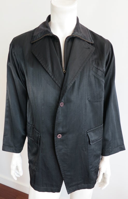 Vintage MATSUDA JAPAN 1980's sateen double layer look jacket.  The inner layer has a zipper front opening, and the outer layer is a double button closure.  Dual waist level flap pockets, with left chest angled welt pocket.

Underarm to underarm: