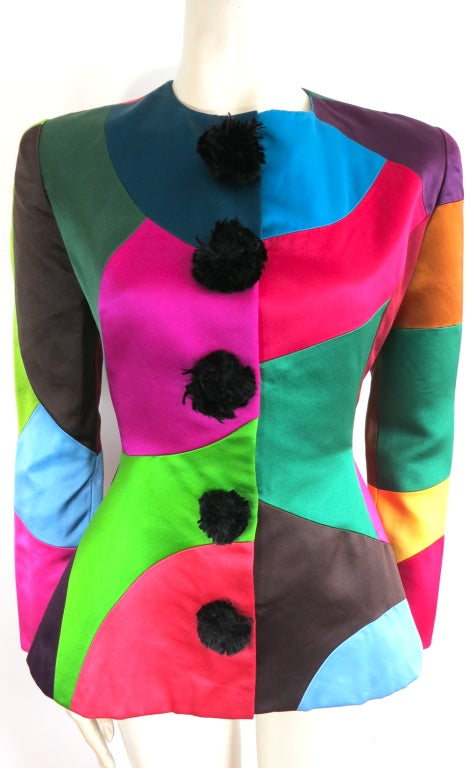 Stunning OSCAR DE LA RENTA 1990's satin color blocked, seam paneled jacket with beaver fur pom front embellishment.  This is not a printed jacket.  All color panels are sewn in and seamed. Concealed snaps beneath front opening. Fitted waist with a