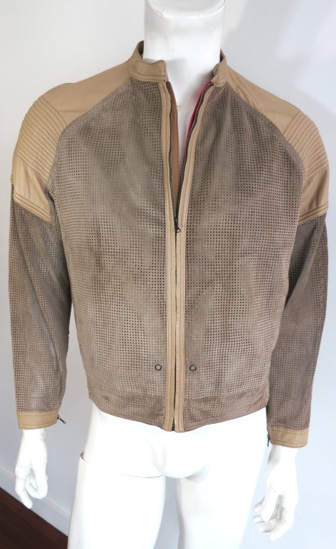 Vintage GIANFRANCO FERRE Olive perforated suede & leather jacket.  The jacket is made of square shaped, perforated suede with corded leather shoulder panels.  The front panels are backed with cotton twill.  The back panel and sleeves are semi sheer
