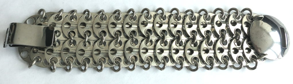 Vintage PACO RABANNE Made in France chain mail bracelet cuff.  Large dome locking hardware.

Internal circumference when hardware is locked closed: 8