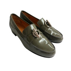 HERMES PARIS Green patent leather ring & bar loafers