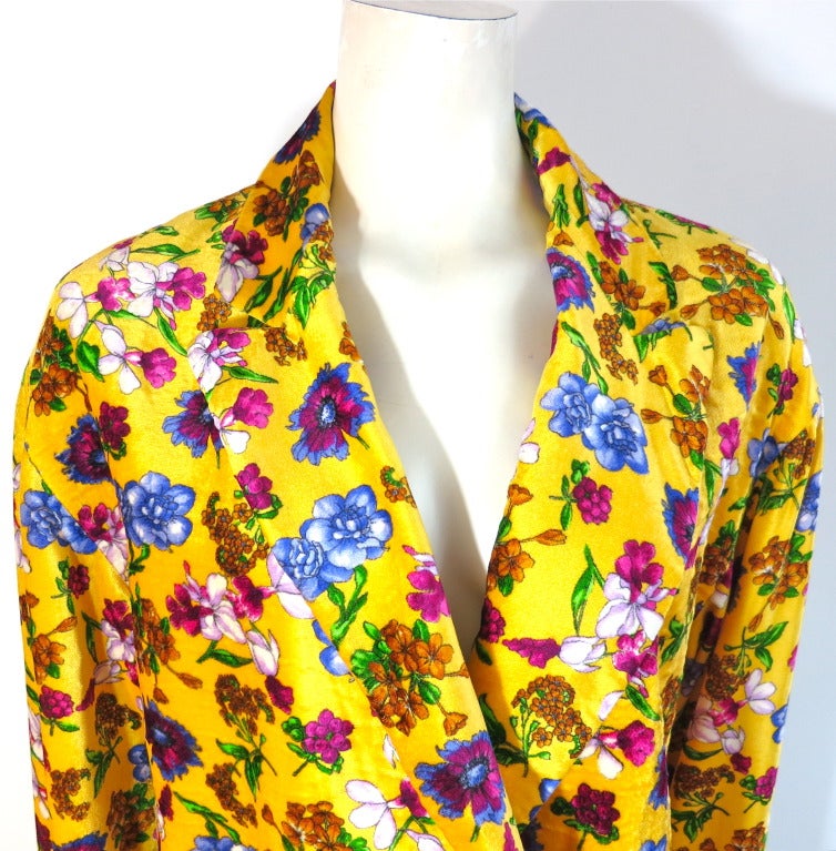 GIANNI VERSACE COUTURE early 1990's floral/botanical printed silk velveteen coat.  Highly detailed artwork print onto a super soft velveteen.  Double breasted front, loose fit silhouette with twin, red and gold, ornate button closures.  Dual waist