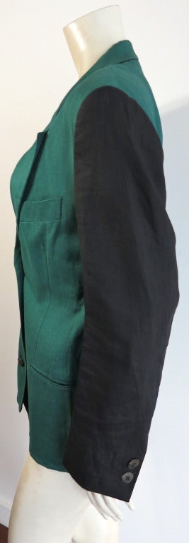 RONALDUS SHAMASK Dark green and black color-blocked linen blazer.  Triple, horn button front closures with dual, bound waist pockets.

Original 'Sample' as indicated at interior side seam label.

Measurements:

Underarm to underarm: 19