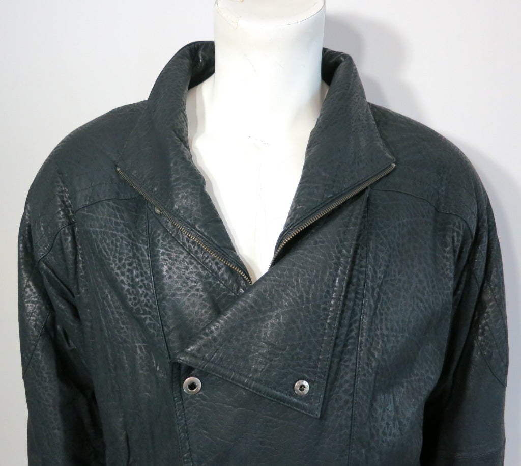 Vintage COURREGES HOMME PARIS Men's leather jacket with elephant skin pattern embossing.

The jacket is 100% genuine leather with elephant skin pattern on top.

True 1980's silhouette and styling with structured shoulders, and oversized front,