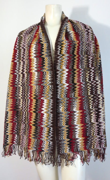 MISSONI ITALY Chenille zig-zag multi-color large scarf/wrap.

The scarf is incredibly soft and plush, created with chenille yarns that are knitted and stitched together creating the signature zig-zag artwork pattern.

The colors are dark