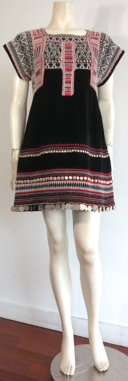 Amazing JEAN-PAUL GAULTIER embellished, fair isle sweater dress.

The matching bodysuit to this dress is featured in the current museum exhibit, The Fashion World of Jean Paul Gaultier: From the Sidewalk to the Catwalk, and is from his 