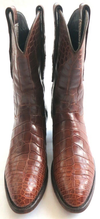 Stunning LOVELESS women's african crocodile skin boots in gorgeous, rich shade of brown.

These excellent condition, custom made boots feature shaped side tabs at the top opening at both sides.  Inner side tab has 'hedi' dye-cut, stitch detailing