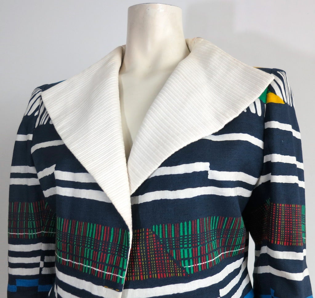 Vintage ARNOLD SCAASI printed linen & silk jacket.

This wonderful jacket was designed by Arnold Scaasi in the USA during the 1980's.

The jacket features a bold, colorful striped print atop linen fabrication. 

The lapel is made of solid