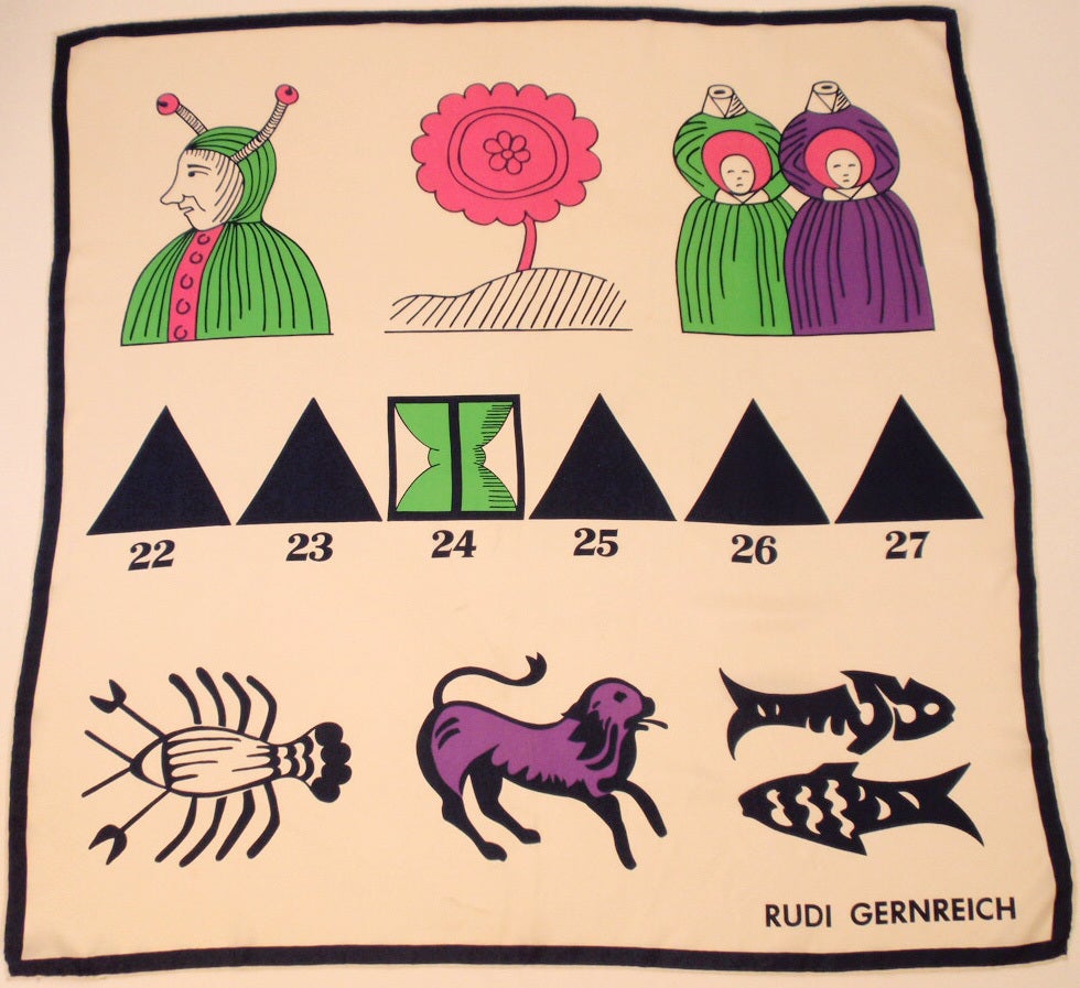This is an authentic Rudi Gernreich Silk Scarf. It has a black, pink, green and purple print of headless women, zodiac signs and a 