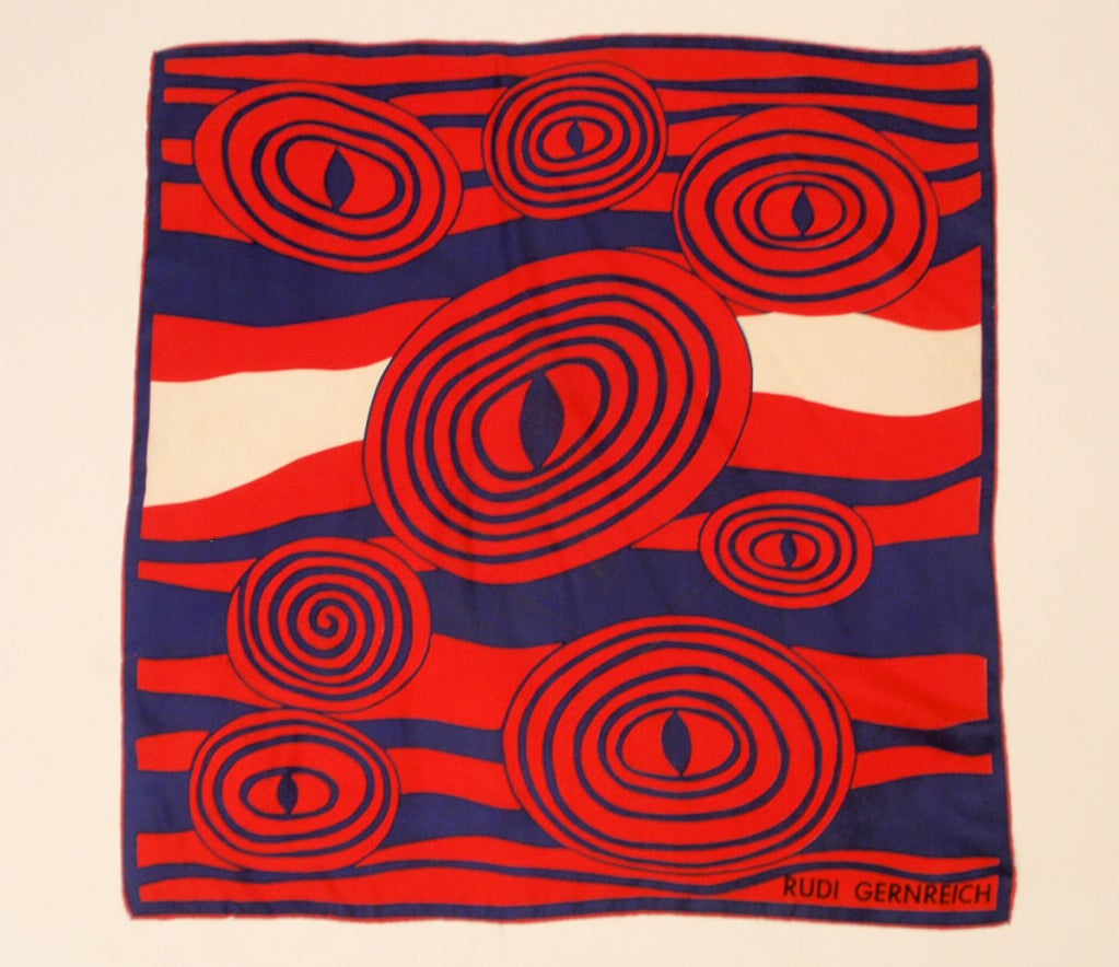 This is a funky scarf from Rudi Gernreich. It is made of 100% silk and has a circle pattern with eyes in the center.

Measurements:

30