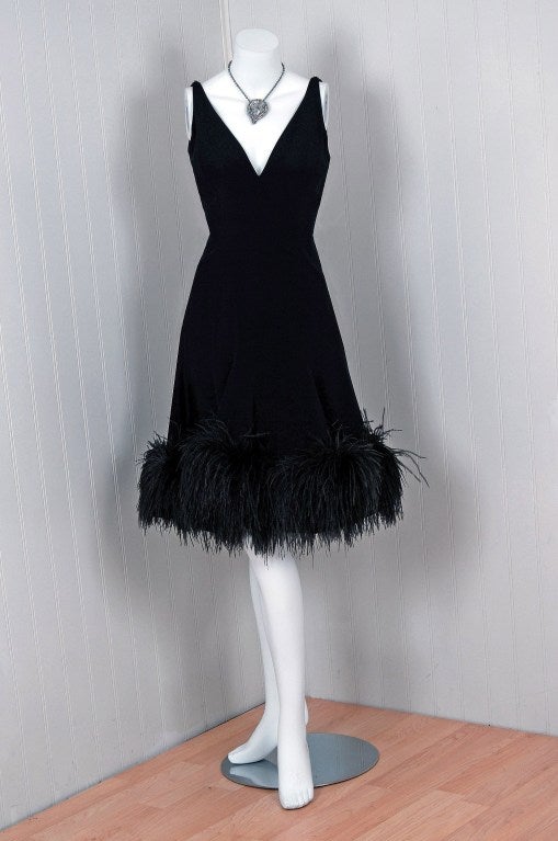 Exquisite late 1950's midnight-black cocktail dress by the famous 