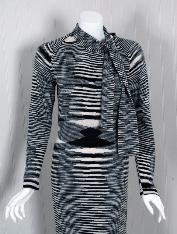 Redefining an entire genre of fashion, the 1970's were seen as Missoni’s launch to fame as the boho chic trends coincided with Missoni’s trippy and psychedelic prints. The deep-charcoal and ivory op-art knit on this dress is so delightfully soft due