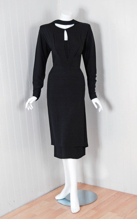 Spectacular mid 1940's femme-fatale cocktail dress by the famous Gilbert Adrian. He created the signature looks for the great Hollywood divas such as Garbo, Shearer, Crawford, Garland, and Harlow. Adrian took into account the actress as well as the