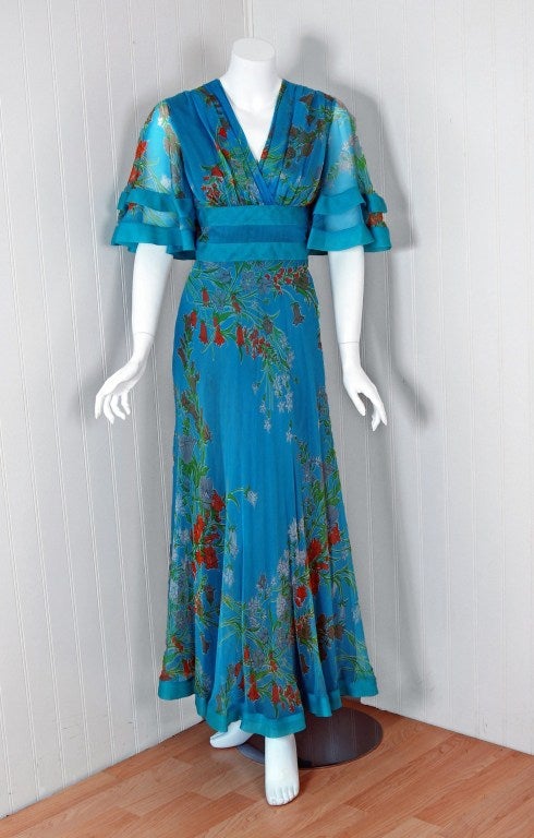 Ethereal turquoise-blue watercolor floral-print gown by a great french couturier, Jacques Heim. The entire garment is fashioned from 