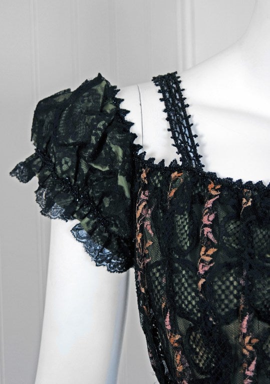 Undiminished by time, this antique garment still casts its seductive spell. An exceptional Edwardian gown made of fine french-lace over sage-green taffeta with sparkling beadwork. I love the slightly puffed off-shoulder bodice. The additional