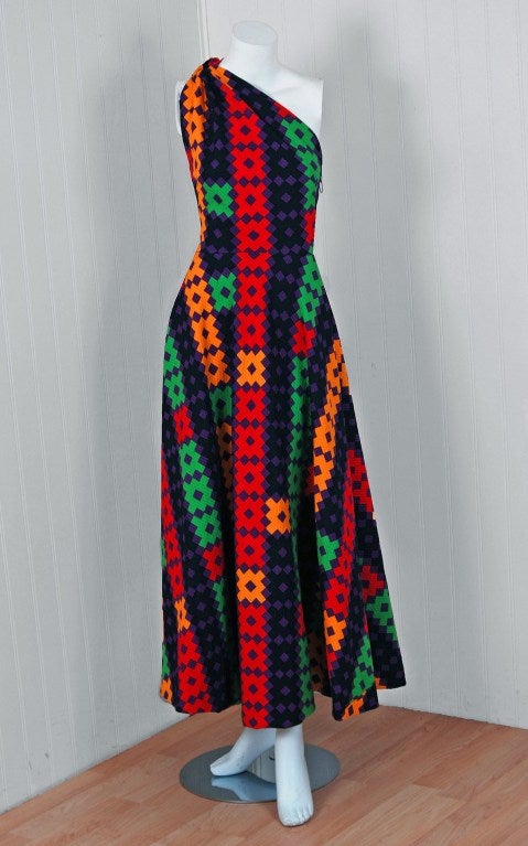 This extremely chic Lanvin treasure, in the most stunning graphic textured-cotton, is a statement dress. I love the rainbow of colors and modern grecian-goddess vibe. It manifests liveliness and makes you feel confident. Shaped with princess-line