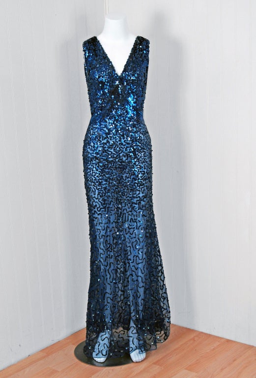 A stunning sapphire-blue shimmering sequin-net gown from the 