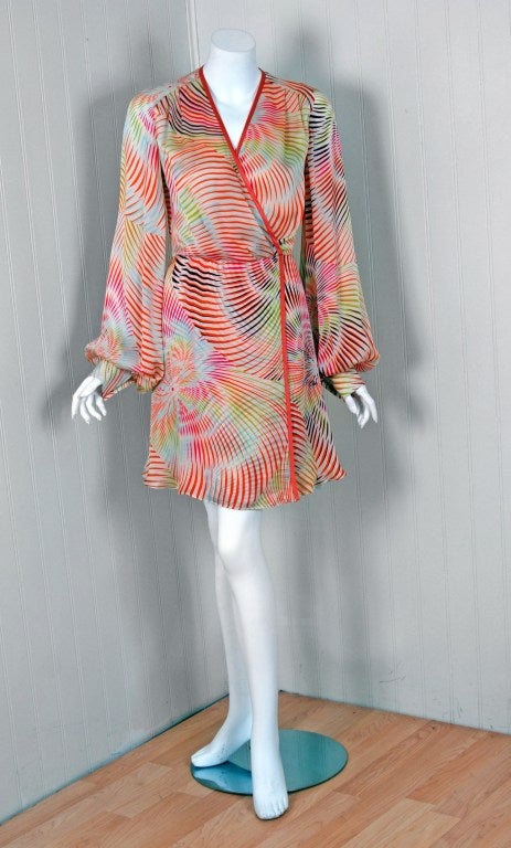 Redefining an entire genre of fashion, the 1970's were seen as Missoni?s launch to fame as the boho chic trends coincided with Missoni?s trippy and psychedelic prints. The colorful op-art print silk on this dress is so delightfully soft due to its