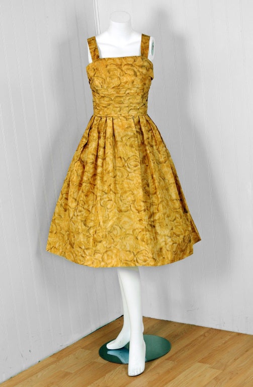 With its vivid golden-yellow floral print and flawless 