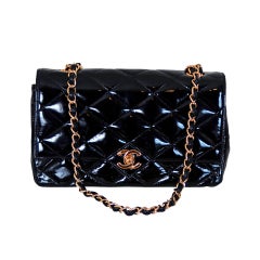 1990
s Chanel Elegant Black Patent-Leather Quilted Flap Purse 1990
s Chanel Elegant Black Patent-Leather Quilted Flap Purse