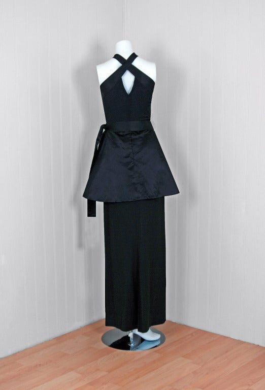 1956 Traina-Norell Sculpted Black Satin and Rayon Peplum Evening Gown ...