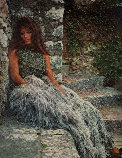 Exceptional & ultra-rare Donald Brooks feather gown famously featured in the 1967 fashion magazine McCall. Brooks was perhaps one of the most important designers of the mid-twentieth century. Though he was very successful, his passion was his work