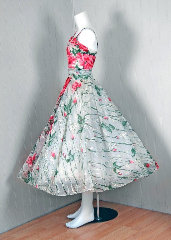 With its vivid pink-roses watercolor floral print and flawless 