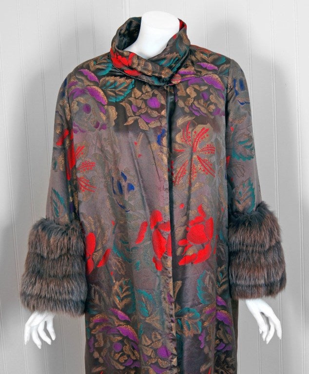 This breathtaking and unbelievable Boston designer metallic rose-garden floral lame & genuine fox-fur coat will make any woman shine during cold snowy months. The care to piece the fox-fur cuffs together after carefully selecting matching hues must