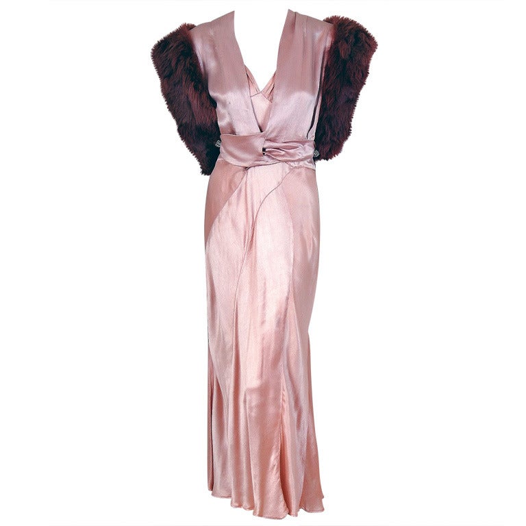A stunning champagne-pink shimmer silk-satin gown ensemble from the 