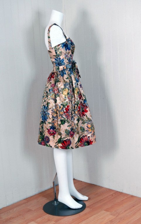 With its vivid watercolor floral print and flawless 