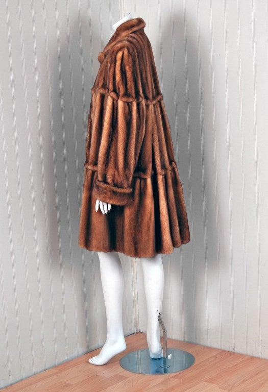 Breathtaking Fendi Haute-Couture genuine mink-fur coat which originally retailed for $72,000. In the mid 1960's Fendi hired designer Karl Lagerfeld and this proved to be a highly successful union. The direction of the company changed from a small