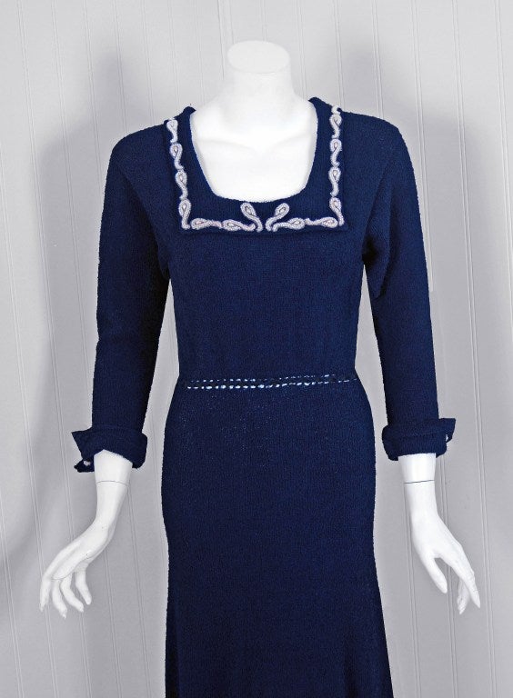 Hourglass 1940's hand-knit stretch garments are in a class of their own! They are always fit to flatter the figure and have a certain timeless quality. This navy-blue wool treasure has fantastic pearl beadwork on the collar & cuffs which works so