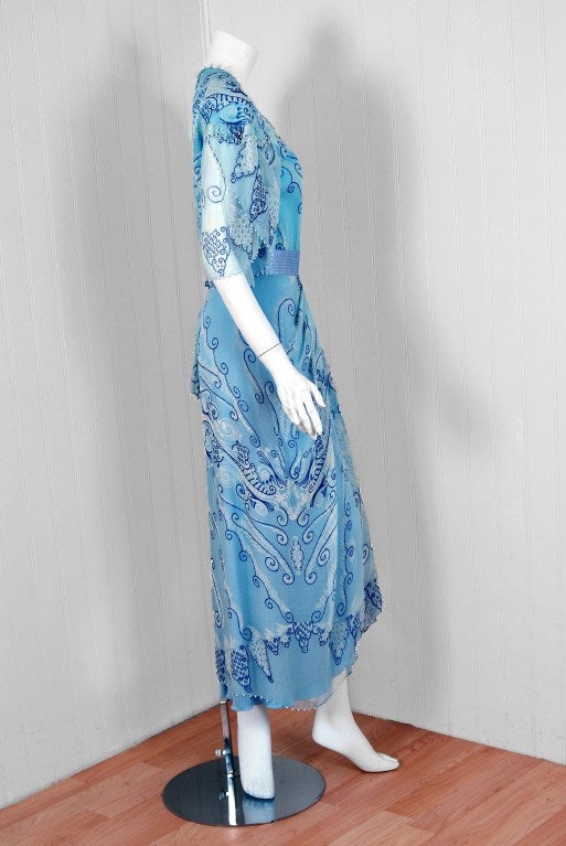 Zandra Rhodes was one of the British designers who put London at the forefront of the international fashion scene in the 1970's. Her designs are considered creative statements, dramatic but graceful, bold but feminine. Zandra is renowned for her use