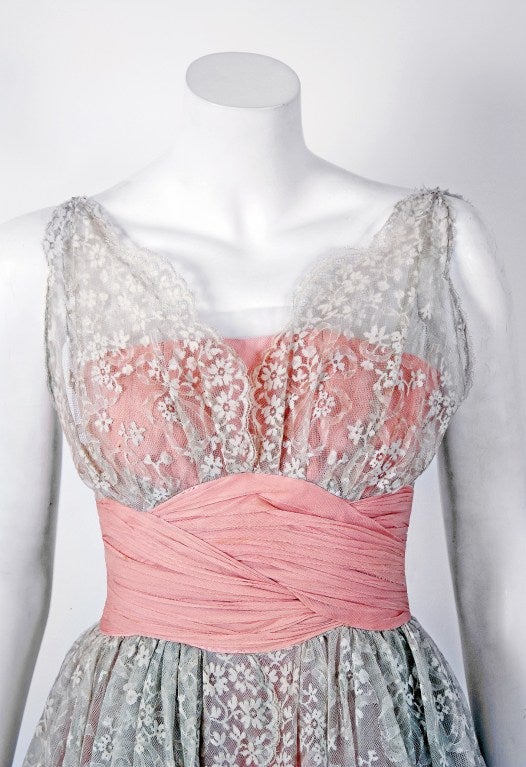 Stunning Jeanne Lanvin Castillo pink silk-chiffon & gray floral-lace party dress dating back to 1956. Castillo was invited by Jeanne Lanvin's daughter to design for her mother's firm in Paris, with hopes of relaunching the firm's name. Jeanne