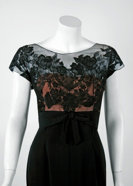 An amazing and highly stylized 1950's evening gown by Peggy Hunt. The silhouette is classic pin-up 